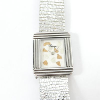 an image of a close up of a watch on a white surface