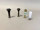 three different types of knobs on a white surface