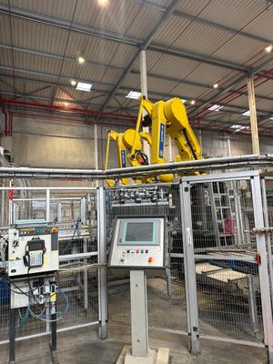 a machine that is working on a piece of machinery