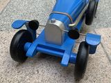 a toy car that is sitting on the ground
