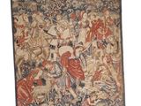 une tapisserie accrochée au mur représentant des personnages et des animaux