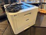 an image of a white printer sitting on top of a counter