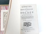 an open book with a picture of a dog on it