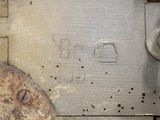 a close up of a metal object with holes in it