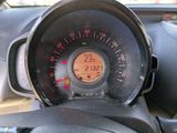 a close up of a speedometer on a car ' s dashboard