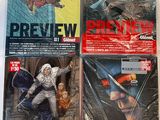 les couvertures des bandes dessinées sont alignées sur une table