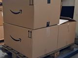 two boxes on a pallet with arrows on them