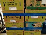 several boxes stacked on top of each other in a store