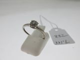 a close up of a ring with a price tag on it