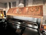 an image of a kitchen with a stove and a large oven