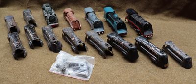 a lot of toy cars that are sitting on the floor