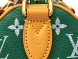 louis vuitton green and orange monogramet leather bag with gold hardware