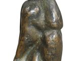bronze statue of a woman holding a child in her arms