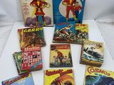 a lot of comics on the table together
