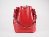 a red bucket bag on a white background