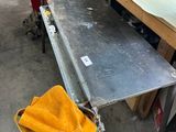 an image of a workbench with a yellow towel on it