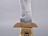 a knife that is sitting on top of a knife holder