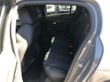 the back seats of a car are empty in the parking lot