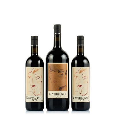 trois bouteilles de vin sur lesquelles figure le visage d'une femme