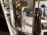 a mirror that has a picture of a woman in it