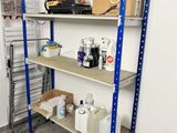 a shelf that has various items on it in a room