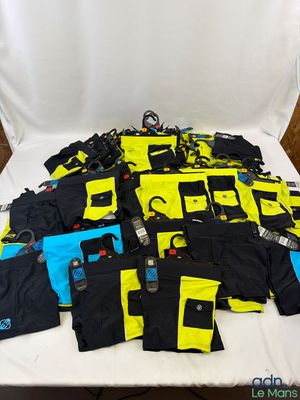 a pile of clothing that is sitting on a table