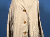 an image of a beige coat on a mannequin mannequin mannequin mannequin mannequin mannequin mannequin mannequin