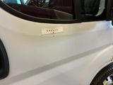 a white van with a sticker on the side of it
