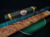 three different types of yoga mats on a black surface