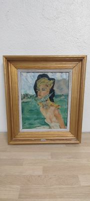 une photo d'un tableau représentant une femme accroché au mur