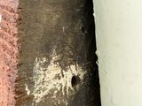 a close up of a piece of wood with a hole in it