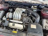 a picture of a car engine with its hood open