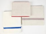 three napkins with red, white, and blue stripes are stacked on top of each other
