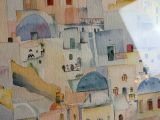 a picture of a painting of a city on the wall