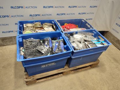 two blue bins filled with assorted items sitting on top of a wooden pallet