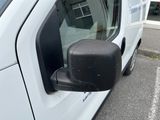 an image of a side view mirror of a van