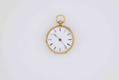 an old gold pocket watch with roman numerals and roman numerals on the face