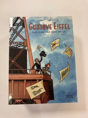 a book with a picture of a man on top of a boat