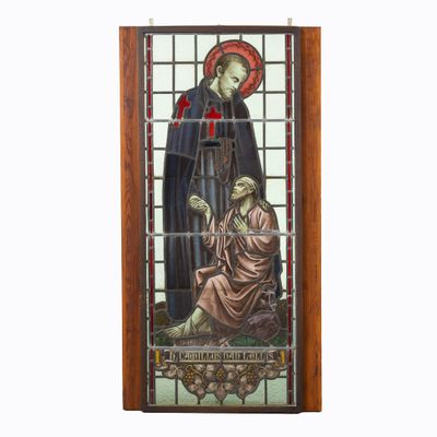 stained glass window with a picture of a man and a woman