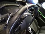 a close up of a steering wheel in a car