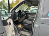 the interior of a van with the door open and the driver ' s seat down