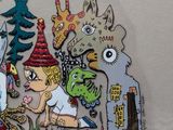 a picture of a group of cartoon characters on a wall