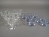a lot of empty wine glasses sitting on a table