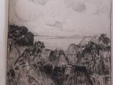 an open book with a drawing of a landscape on it