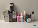 many different types of beauty products sitting on a table