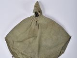 a bag with a hole in it on a white surface