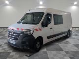 la photo d'une camionnette blanche garée dans un garage