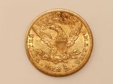 an image of a gold coin with an eagle on it