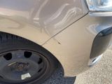 a close up of a car ' s tire on the street
