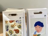 two boxes with a picture of a woman on them